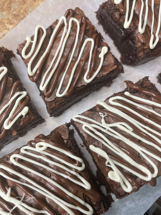 Chocolate Drizzle Brownies are deluxe brownies with white chocolate or chocolate drizzle topping